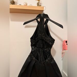 7th grade winter formal dress
Worn once
Open back 
Size 000